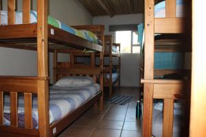 Кровать или кровати в номере The Wild Farm Backpackers