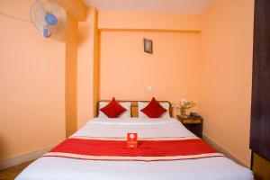 Rúm í herbergi á Hotel Premium