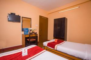 Rúm í herbergi á Hotel Premium