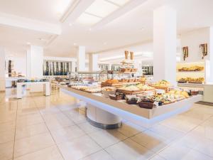 a buffet table with a variety of foods on it at Iberostar Las Dalias - All Inclusive in Adeje