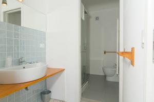 Koupelna v ubytování Agriturismo di Serragiumenta