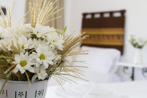 Postel nebo postele na pokoji v ubytování Agriturismo di Serragiumenta
