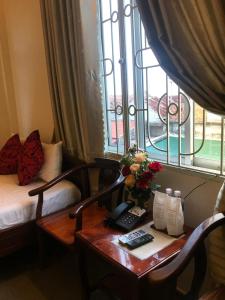 Posezení v ubytování Nam Long Hotel