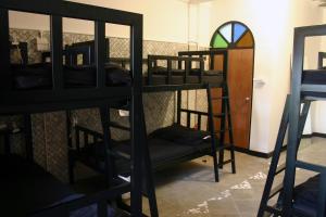 Postel nebo postele na pokoji v ubytování Born Free Hostel