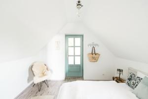 Katil atau katil-katil dalam bilik di Noemi's Cottage