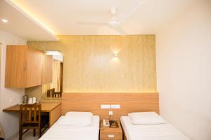 Hotel Kapilavasthu客房内的一张或多张床位