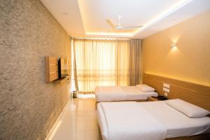 Hotel Kapilavasthu客房内的一张或多张床位