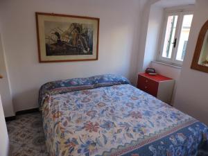 Posteľ alebo postele v izbe v ubytovaní La Casa nel Borgo