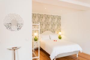 Posteľ alebo postele v izbe v ubytovaní Bairrus Lisbon Apartments - Rossio