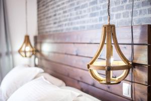 Posteľ alebo postele v izbe v ubytovaní Moscha Hotel