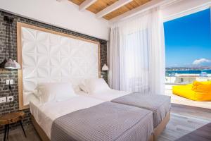 Posteľ alebo postele v izbe v ubytovaní Moscha Hotel