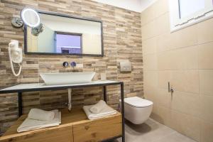 Kúpeľňa v ubytovaní Moscha Hotel