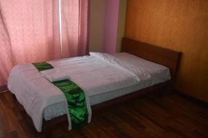 Voodi või voodid majutusasutuse Manaslu Homestay toas