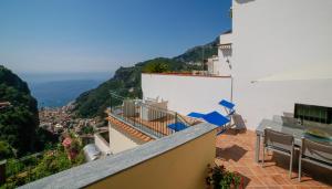 a balcony with a view of the ocean at Amalfi Dream Charming House in Scala