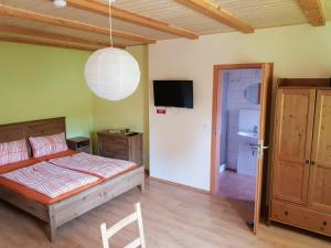 En eller flere senge i et værelse på Ferienwohnungen Margaretenhof, Plaue