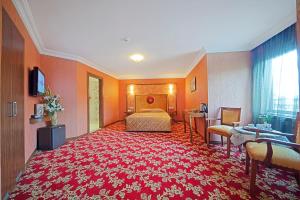 A bed or beds in a room at Antea Palace Hotel & Spa