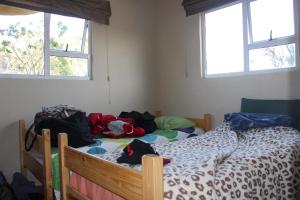 Кровать или кровати в номере The Wild Farm Backpackers