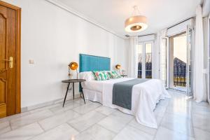 Posteľ alebo postele v izbe v ubytovaní Apartamento Calle Martínez - Larios