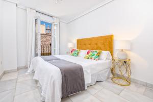 Posteľ alebo postele v izbe v ubytovaní Apartamento Calle Martínez - Larios