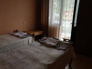 Postel nebo postele na pokoji v ubytování Temo's Guesthouse