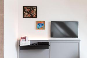 Televisyen dan/atau pusat hiburan di Holiday Inn - the niu, Franz Vienna by IHG