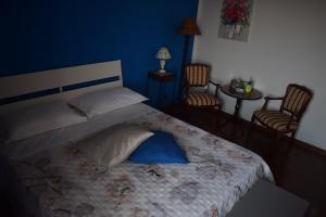 Postel nebo postele na pokoji v ubytování B & B Arco di Sole