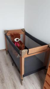 Ένα ή περισσότερα κρεβάτια σε δωμάτιο στο Apartament Emilia