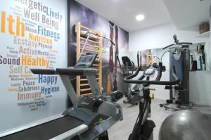 a gym with a treadmill and a exercise bike at Brisa Marina in A Guarda