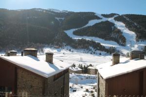 a view from the roof of a house in the snow at Julia, el Tarter, zona Grandvalira in El Tarter