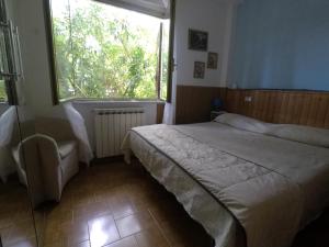Postel nebo postele na pokoji v ubytování Cinqueterre Holidays