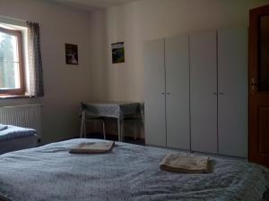 Rúm í herbergi á U nových přátel