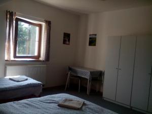 Rúm í herbergi á U nových přátel
