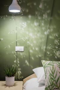 Letto o letti in una camera di Green Town Apartments