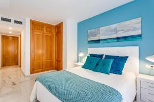 Posteľ alebo postele v izbe v ubytovaní Soho Riverside Suite Málaga