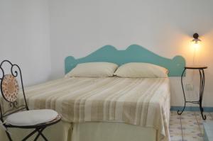 Llit o llits en una habitació de Villa La Gioiosa