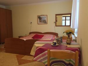 Ein Bett oder Betten in einem Zimmer der Unterkunft Apartment Villa Ana