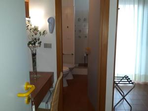 Koupelna v ubytování Hotel Leuco'