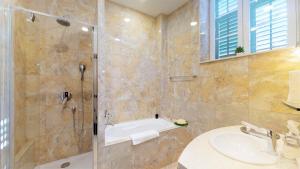 Vannituba majutusasutuses Historic Boutique Hotel Cattaro