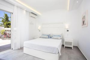 Postel nebo postele na pokoji v ubytování White Passion + 37 fotografií