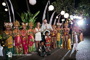 a group of people in dresses posing for a picture at Alami Villa in Ubud +76 photos
