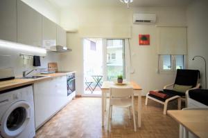 Η κουζίνα ή μικρή κουζίνα στο Heraklion Urban Apartments