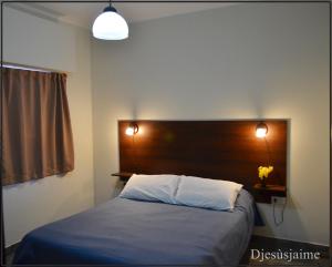 Katil atau katil-katil dalam bilik di Esquina Escondida