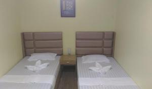 Postel nebo postele na pokoji v ubytování Meaco Royal Hotel - Plaridel