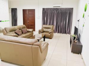 Coin salon dans l'établissement Seaview Homestay Mersing