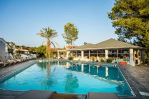 The swimming pool at or close to Coral Blue Beach Hotel Gerakini