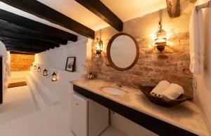 a bathroom with a sink and a mirror at CLIFFSIDE - Boutique Hotel & Spa in Rio de Janeiro