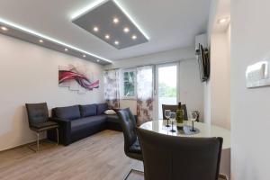 Posezení v ubytování Reza Luxury Apartment