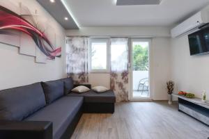 Posezení v ubytování Reza Luxury Apartment