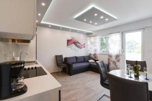 Posezení v ubytování Reza Luxury Apartment