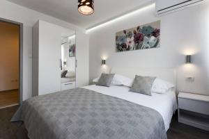 Postel nebo postele na pokoji v ubytování Reza Luxury Apartment